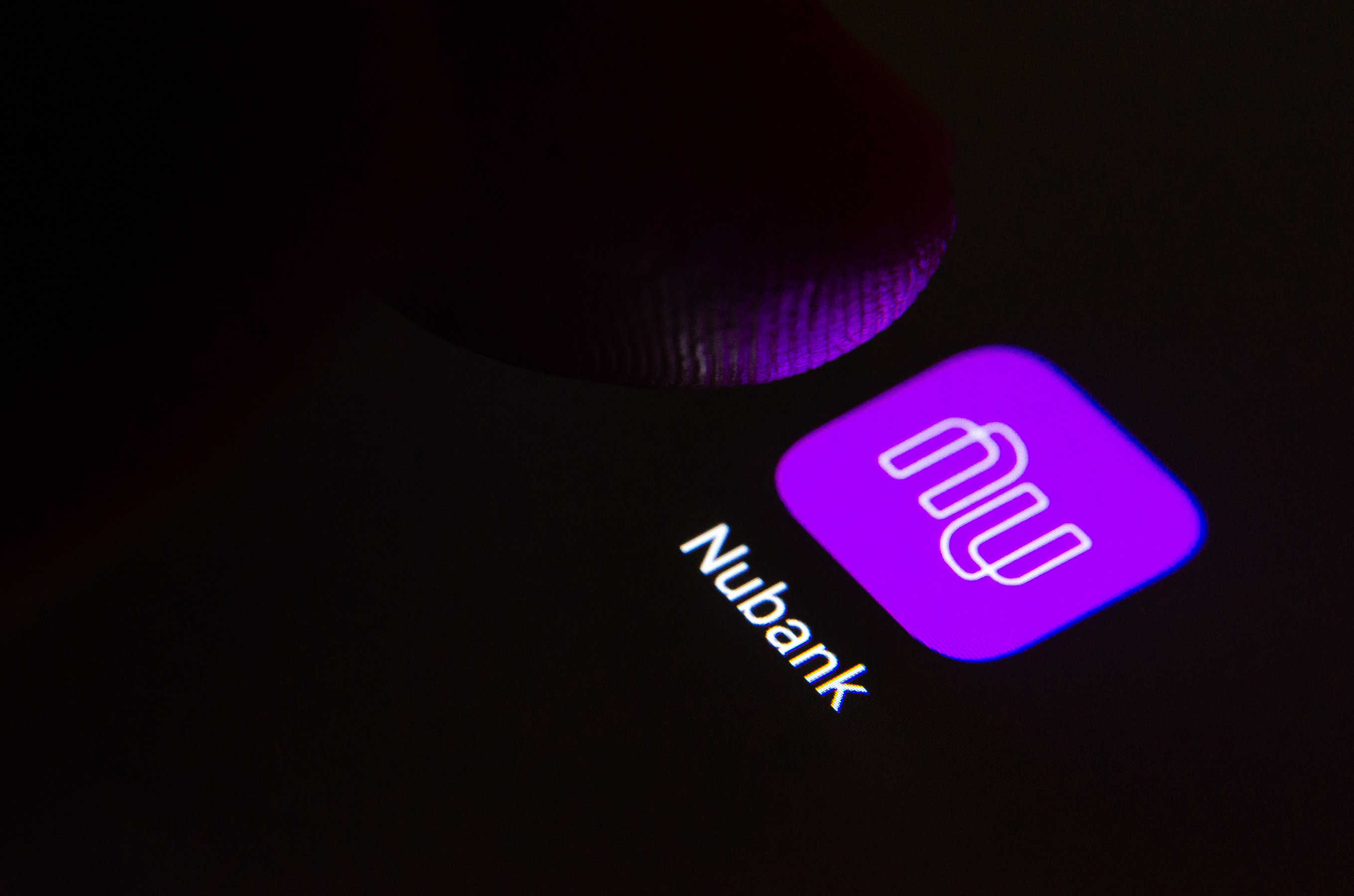Nubank bank app on the screen.